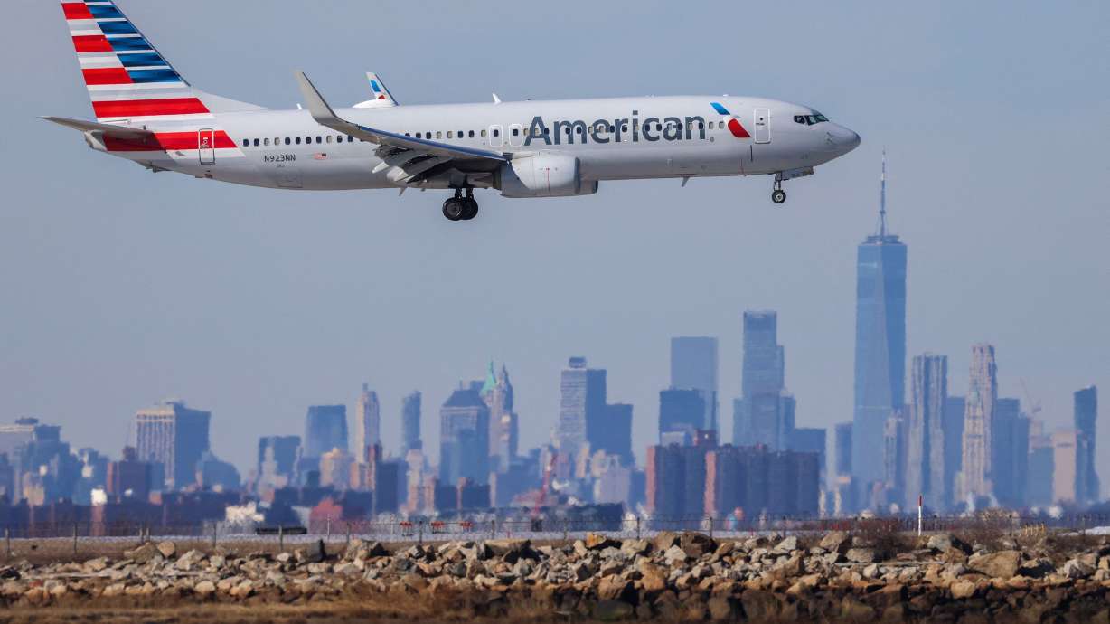 A file photo of an American Airlines plane landing at JFK International Airport in New York. An American Airlines flight from Madrid diverted to New York after all but two of the lavatories on the Boeing 777 stopped working.