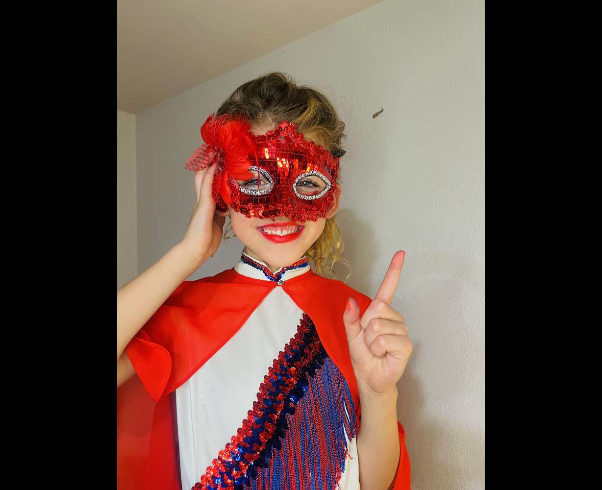 Daisy, age 7, is jockeying to win Stan Lee's Super Kid competition.