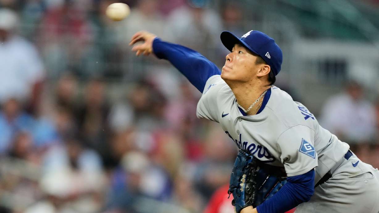 Los Angeles Dodgers' Yoshinobu Yamamoto throws to the Atlanta Braves during the third inning in Game 3 of baseball's National League Division Series, Tuesday, Oct. 6, 2026, in Atlanta.