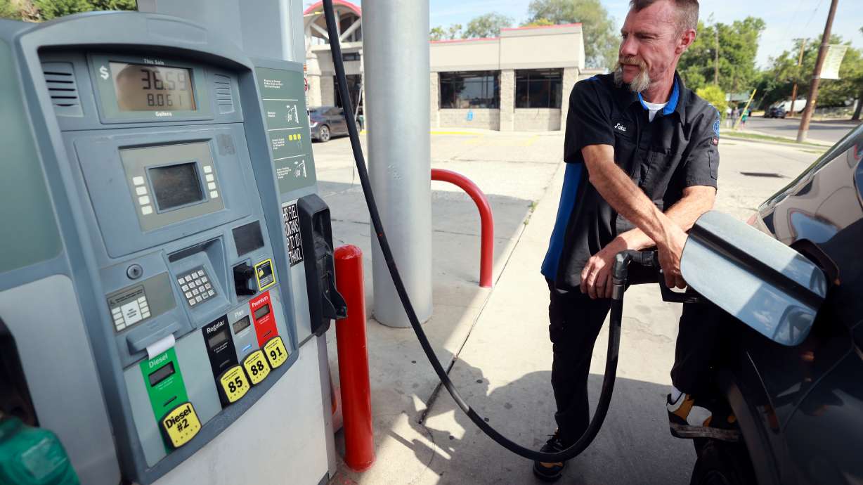 Jake Peacock gets gas at Shoppers Express in Salt Lake City on Aug. 11, 2026. Utah's consumer sentiment dropped 4.6% in September to its lowest level since May.