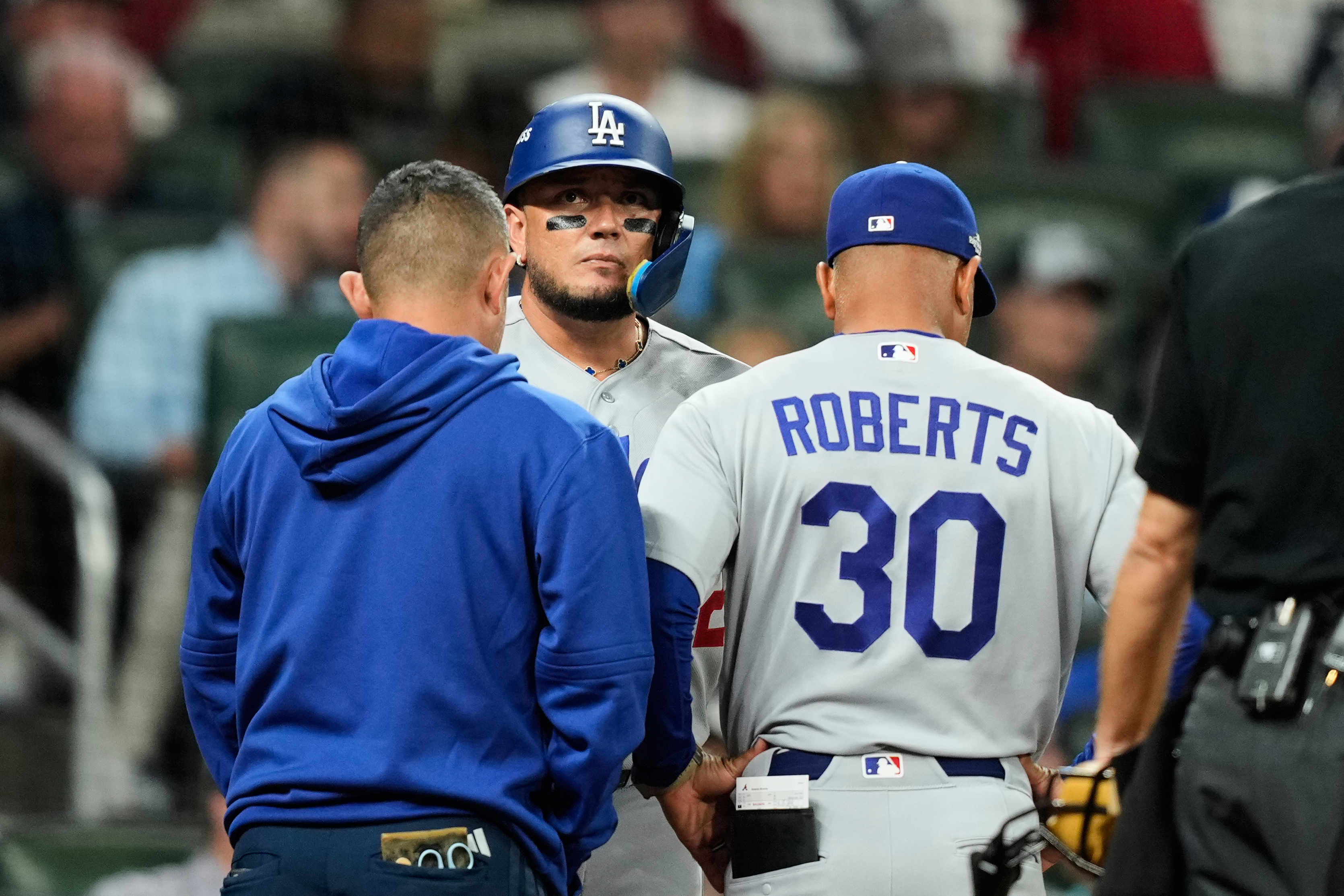 Dodgers hold out Miguel Rojas due to sore back. Ronald Acuña Jr. is starting in RF for Braves