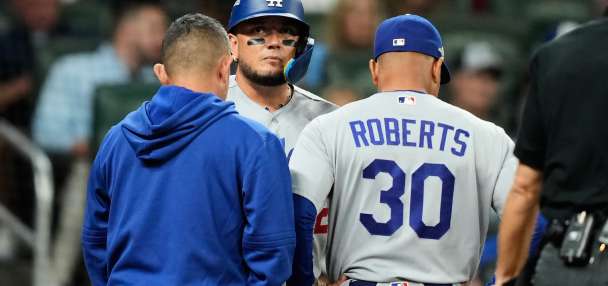 Dodgers hold out Miguel Rojas due to sore back. Ronald Acuña Jr. is starting in RF for Braves