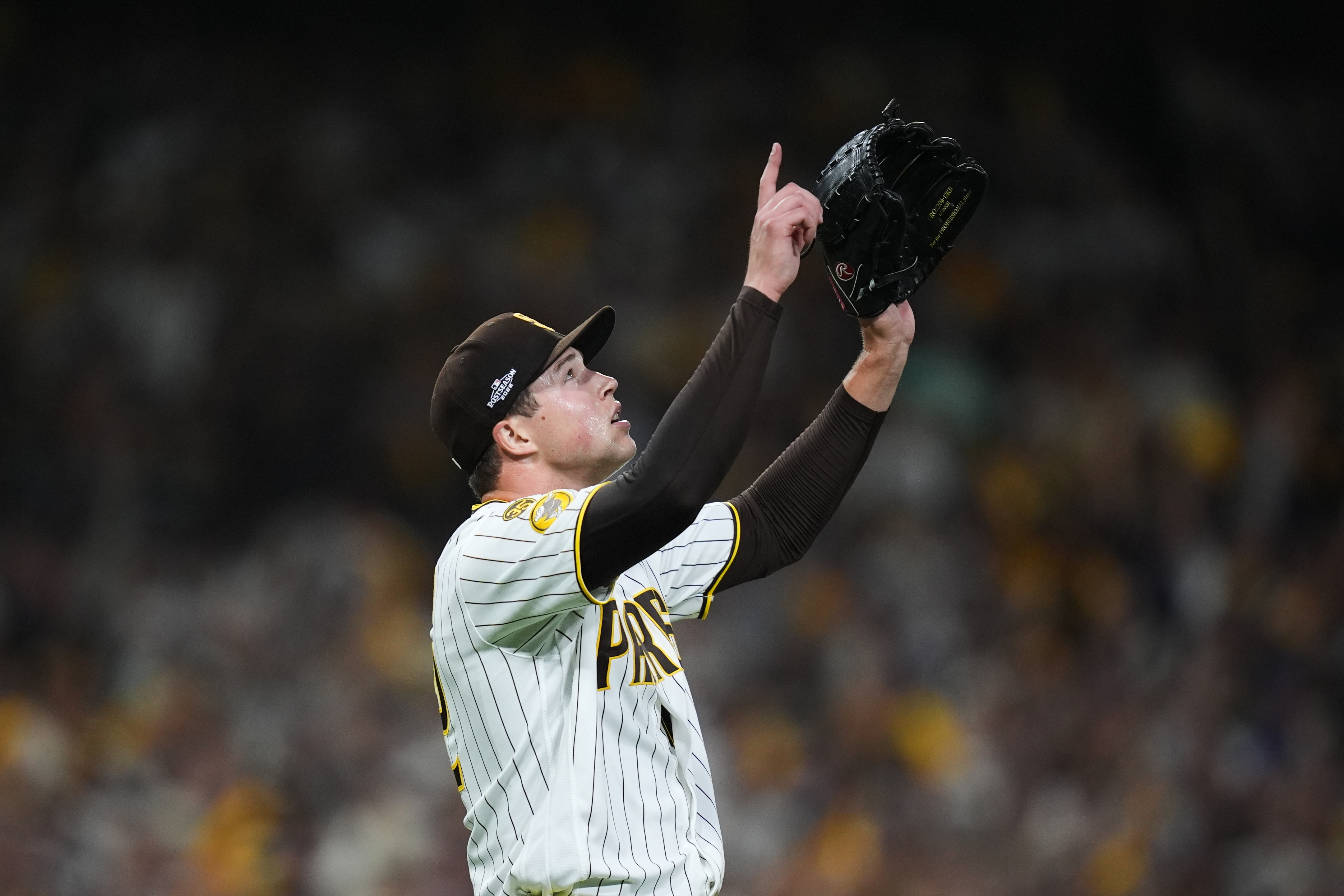 San Diego Padres pitcher Mason Miller reacts after defeating the Chicago Cubs in Game 2 of the National League Wild Card baseball playoff series Wednesday, Sept. 30, 2026, in San Diego. 