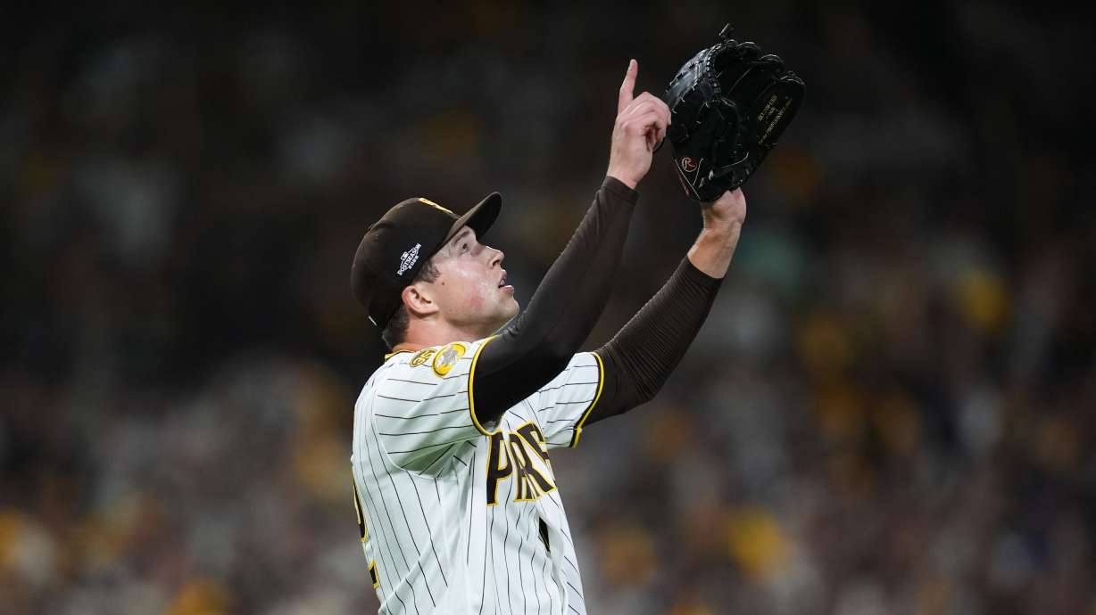 San Diego Padres pitcher Mason Miller reacts after defeating the Chicago Cubs in Game 2 of the National League Wild Card baseball playoff series Wednesday, Sept. 30, 2026, in San Diego.