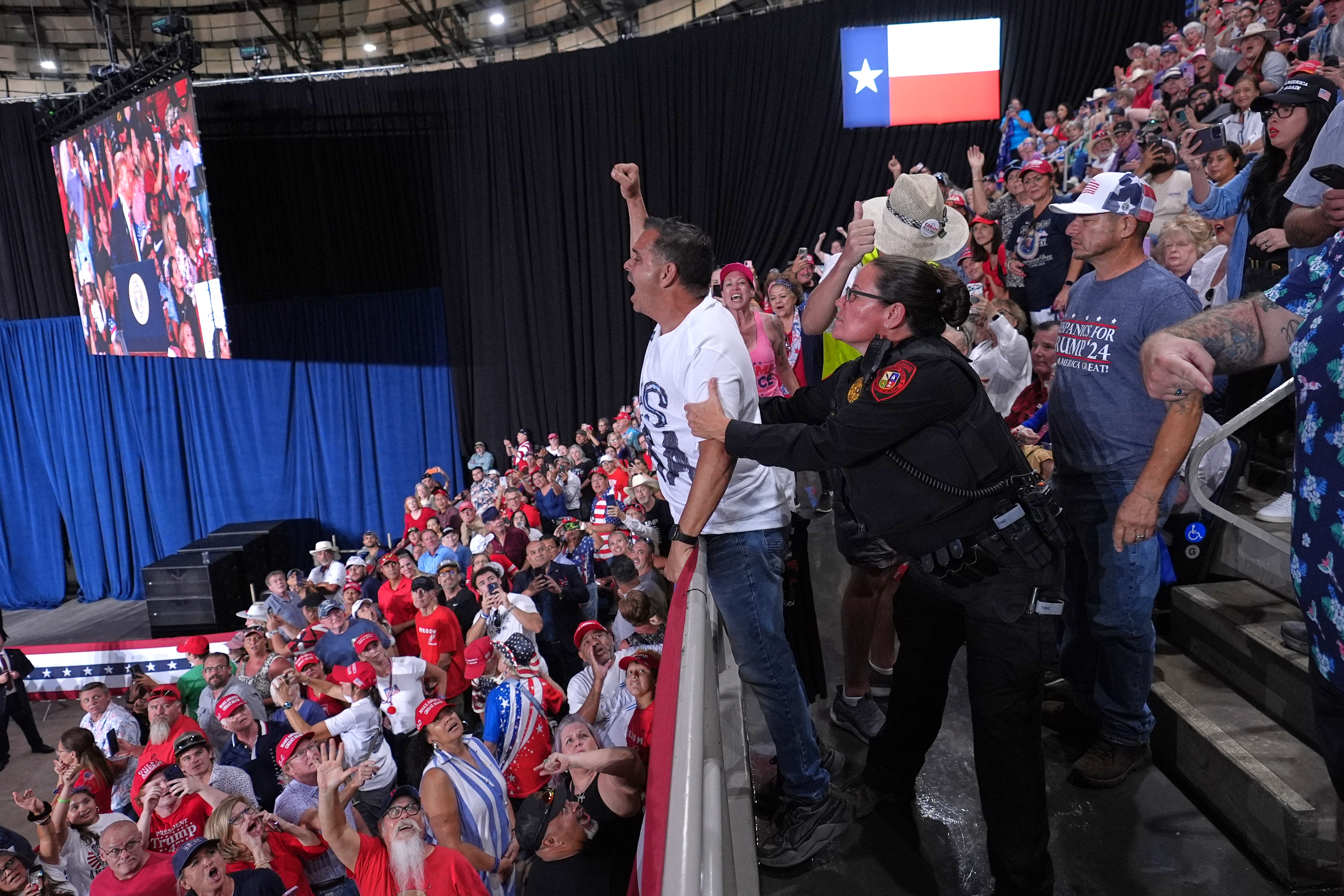 Trump interrupted by protesters as he fights to rally Texas voters behind Paxton in US Senate race