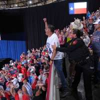 Trump interrupted by protesters as he fights to rally Texas voters behind Paxton in US Senate race
