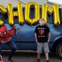 Heart transplant recipient comes home to neighborhood parade