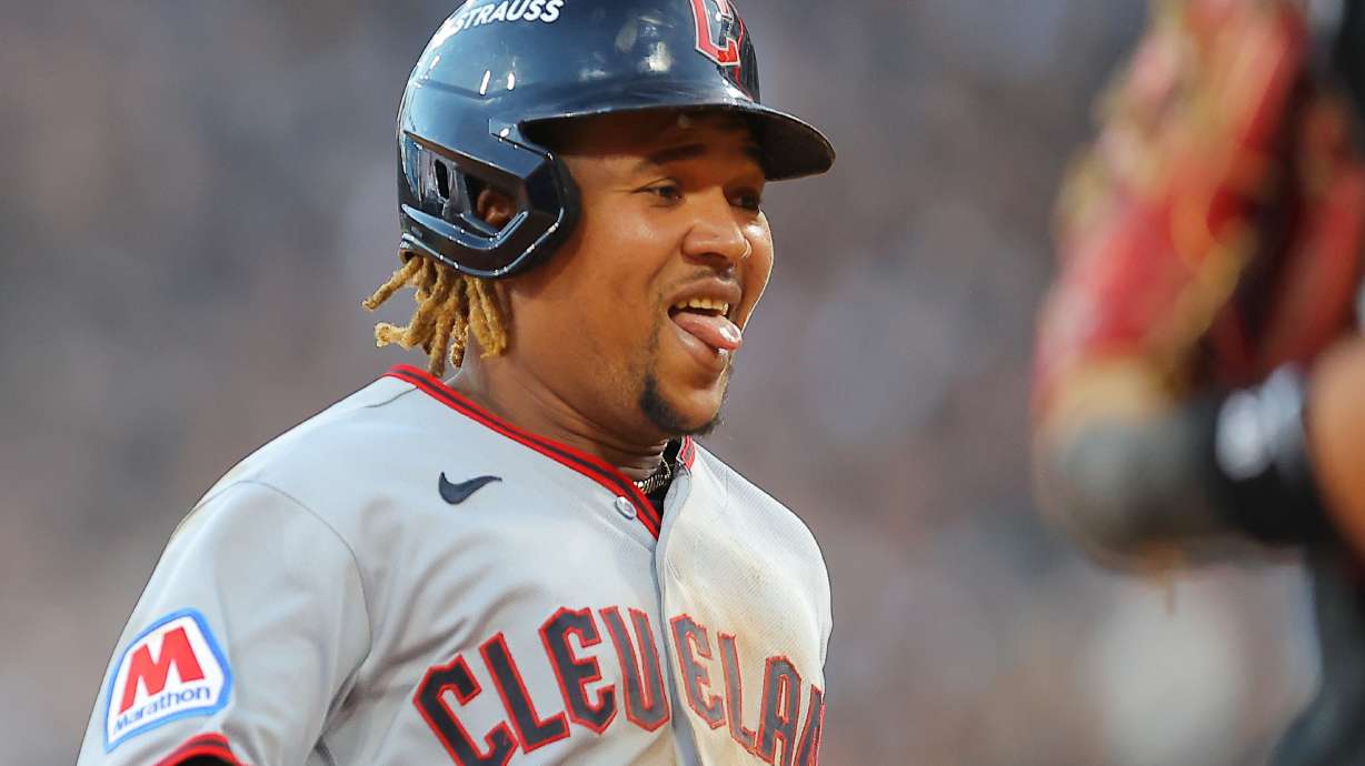 Cleveland Guardians' José Ramírez reacts after hitting a two-run triple against Chicago White Sox pitcher David Sandlin during the eighth inning in Game 3 of baseball's American League Division Series Wednesday, Oct. 7, 2026, in Chicago.
