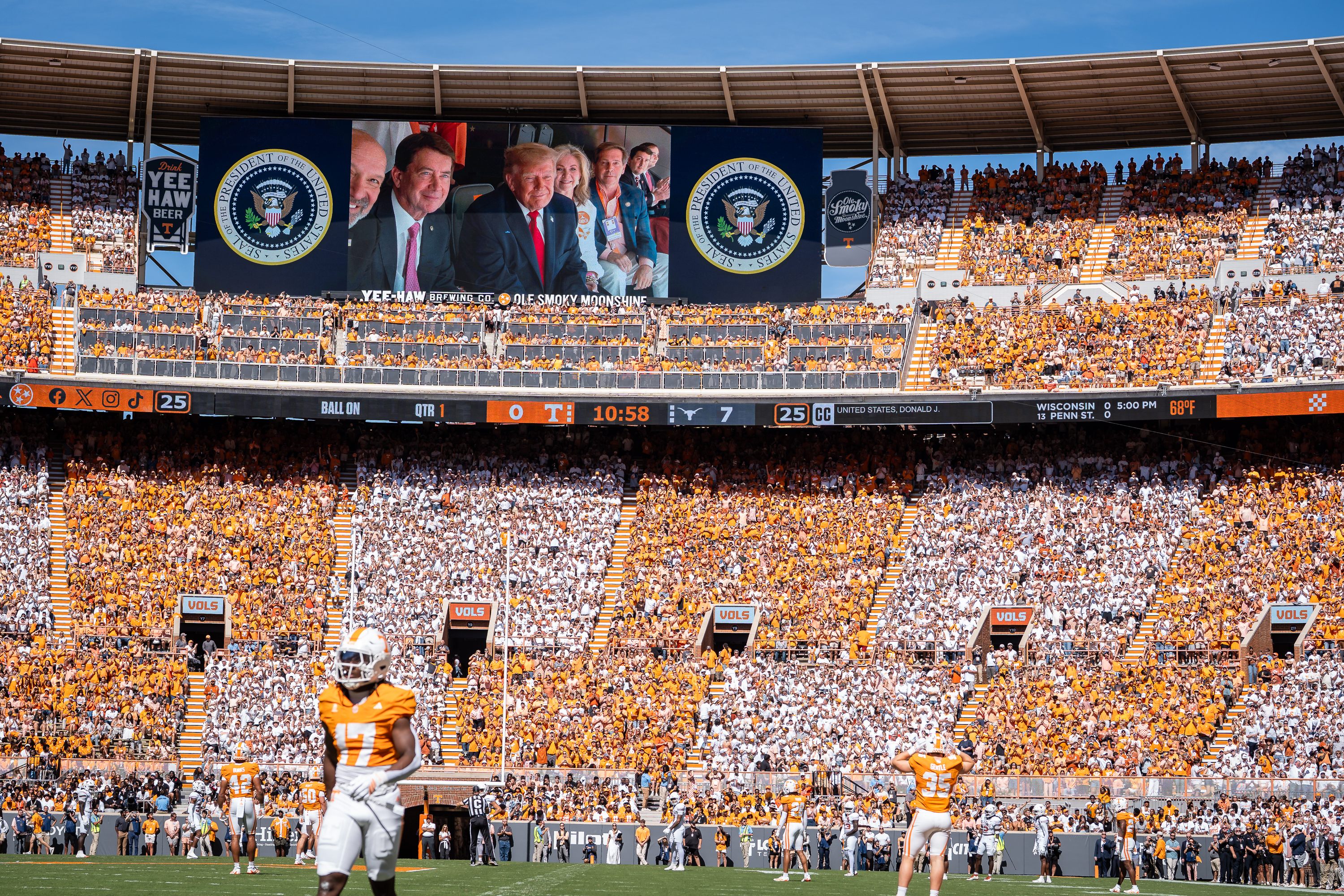 President Donald Trump is displayed on the scoreboard as he attends the Tennessee-Texas NCAA college football game in Knoxville, Tenn., Saturday, Sept. 26, 2026.