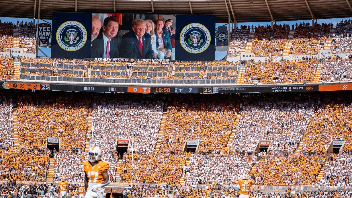 President Donald Trump is displayed on the scoreboard as he attends the Tennessee-Texas NCAA college football game in Knoxville, Tenn., Saturday, Sept. 26, 2026.