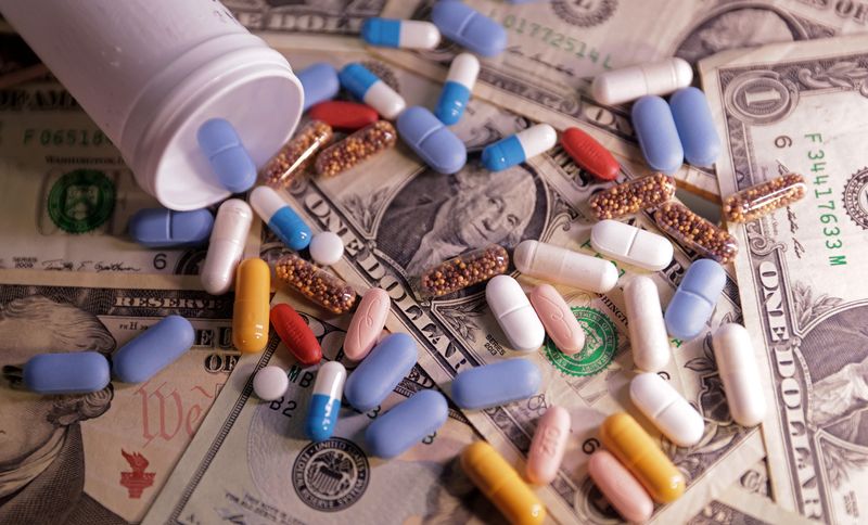 U.S. dollar banknotes and medicines are seen in this illustration taken, June 27, 2024.