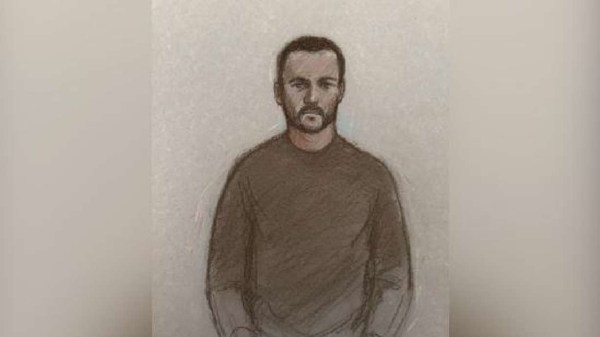 This is a court artist sketch by Elizabeth Cook of Royal Navy sailor Teddy Young appearing at Westminster Magistrates' Court in London, Thursday. Young appeared in court to face charges of spying for Russia.