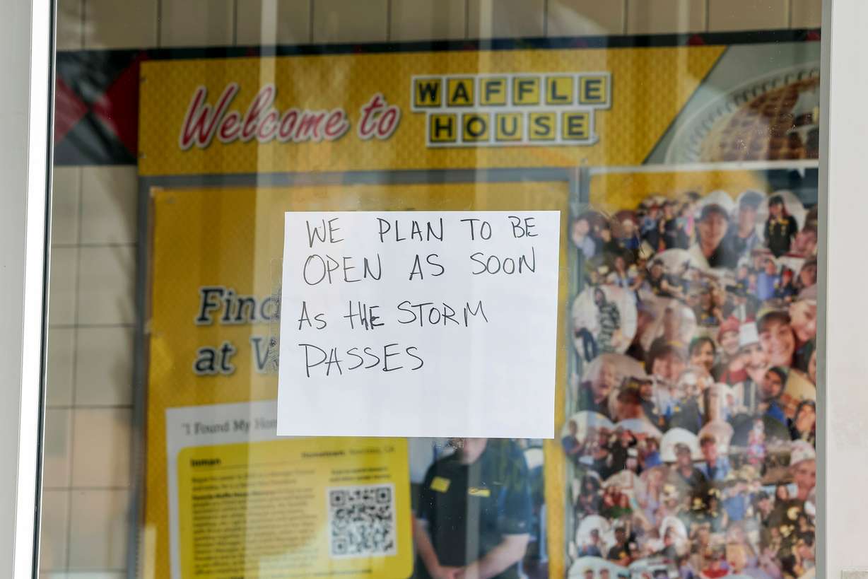 A sign on a closed Waffle House on U.S. 19 in anticipation of Hurricane Milton on Oct. 8, 2024, in New Port Richey, Fla. Southerners normally know that if a Waffle House is closed, destruction is coming to the area.