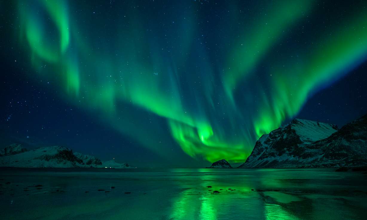 The northern lights from a beach in Iceland.