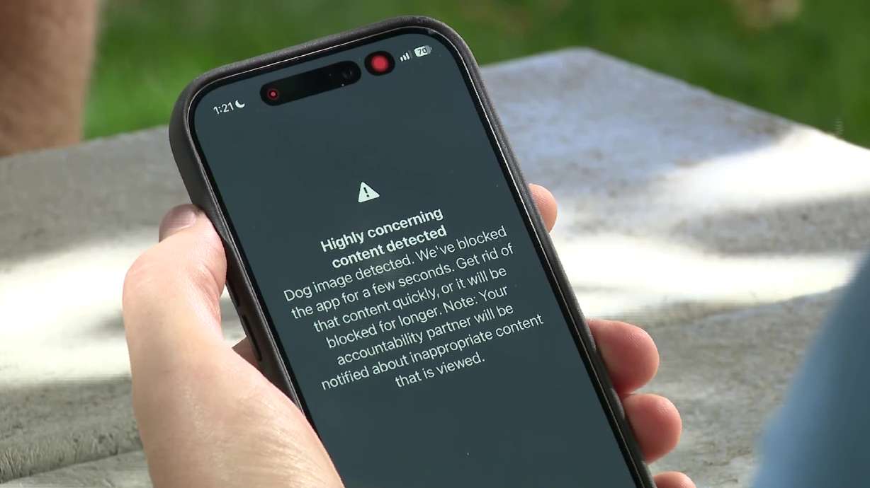 Tyler Patterson shows off his "Ever Accountable" app, designed to help people overcome addiction to pornography.