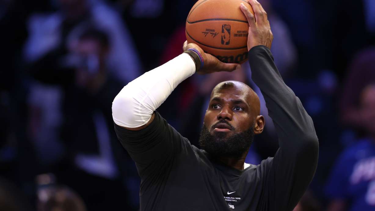 Philadelphia 76ers' LeBron James warms up before a preseason NBA basketball game against the Brooklyn Nets, Thursday, Oct. 8, 2026, in New York.