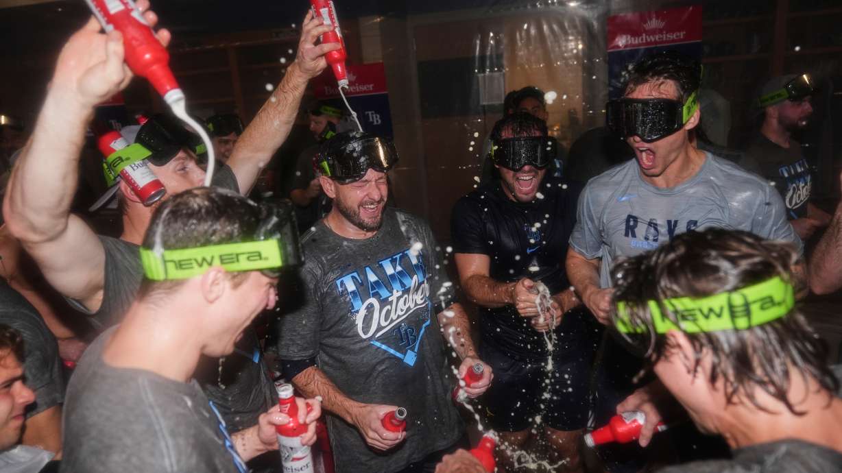 The Tampa Bay Rays celebrate the team's win in Game 3 of baseball's American League Division Series against the New York Yankees, Wednesday, Oct. 7, 2026, in New York.