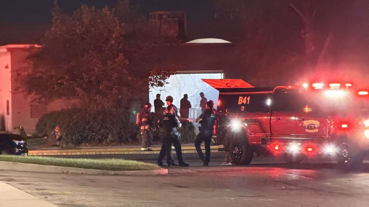 Fire crews respond to a structure fire at a commercial building in South Salt Lake on Thursday. No injuries were reported. The cause has yet to be determined.