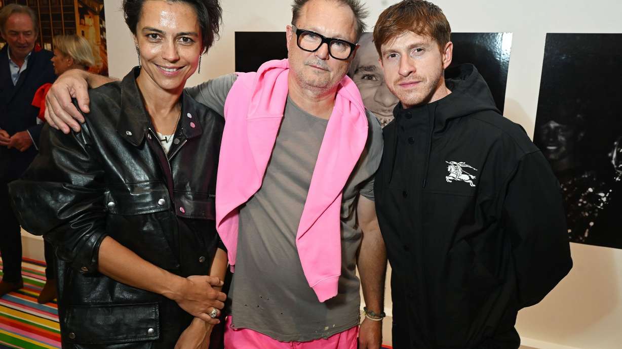 (L to R) Dovile Drizyte, Juergen Teller and Burberry Chief Creative Officer Daniel Lee at the opening party for "The 90s: Art and Fashion" exhibition in London.