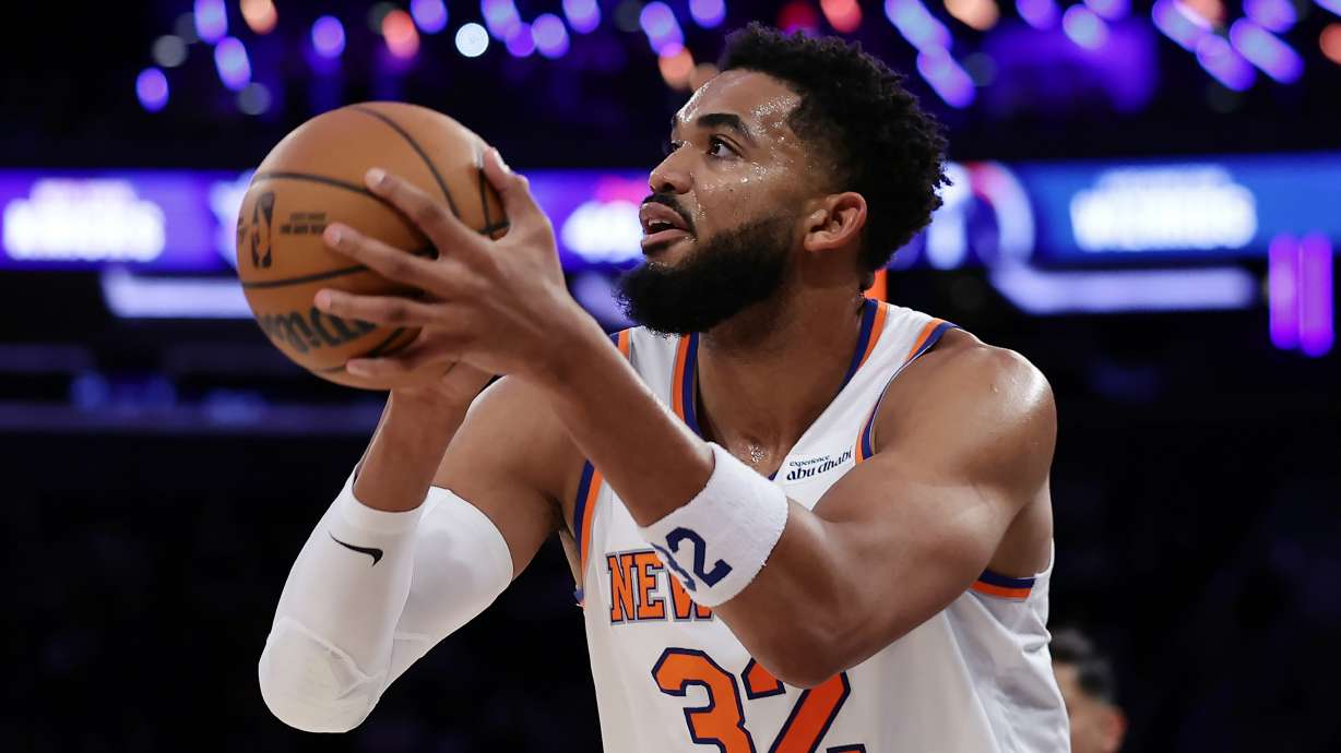 New York Knicks center Karl-Anthony Towns looks to shoot during the first half of a preseason NBA basketball game against the Washington Wizards, Thursday, Oct. 8, 2026, in New York.