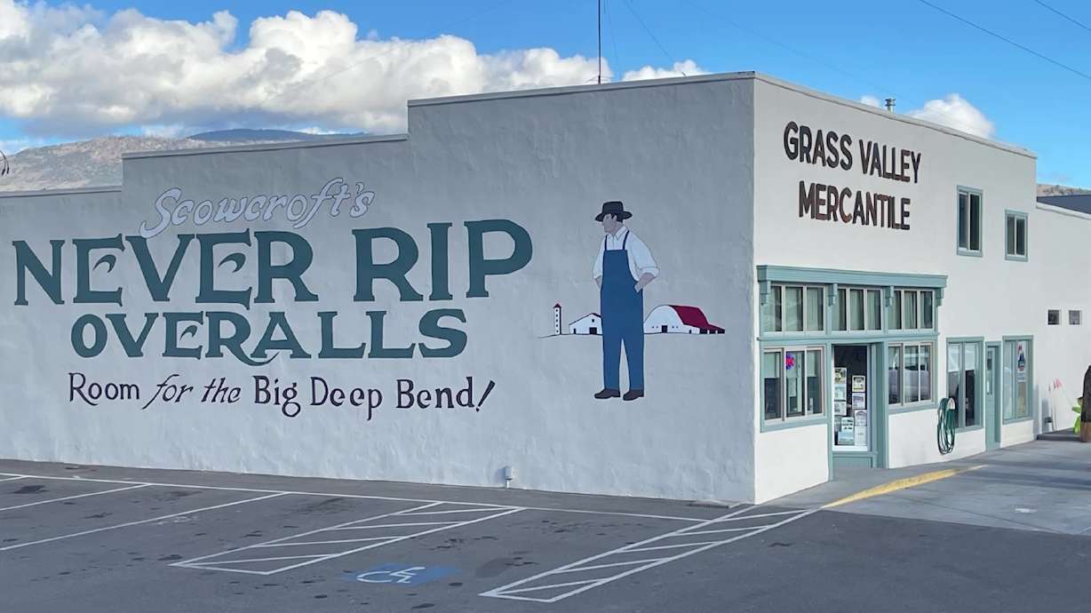 The "Never Rip Overalls" mural is pictured on the Grass Valley Mercantile building in Koosharem, Utah.