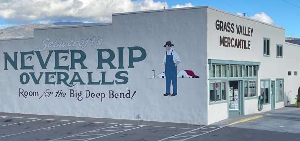 Popular 'Never Rip Overalls' mural at central Utah mercantile restored