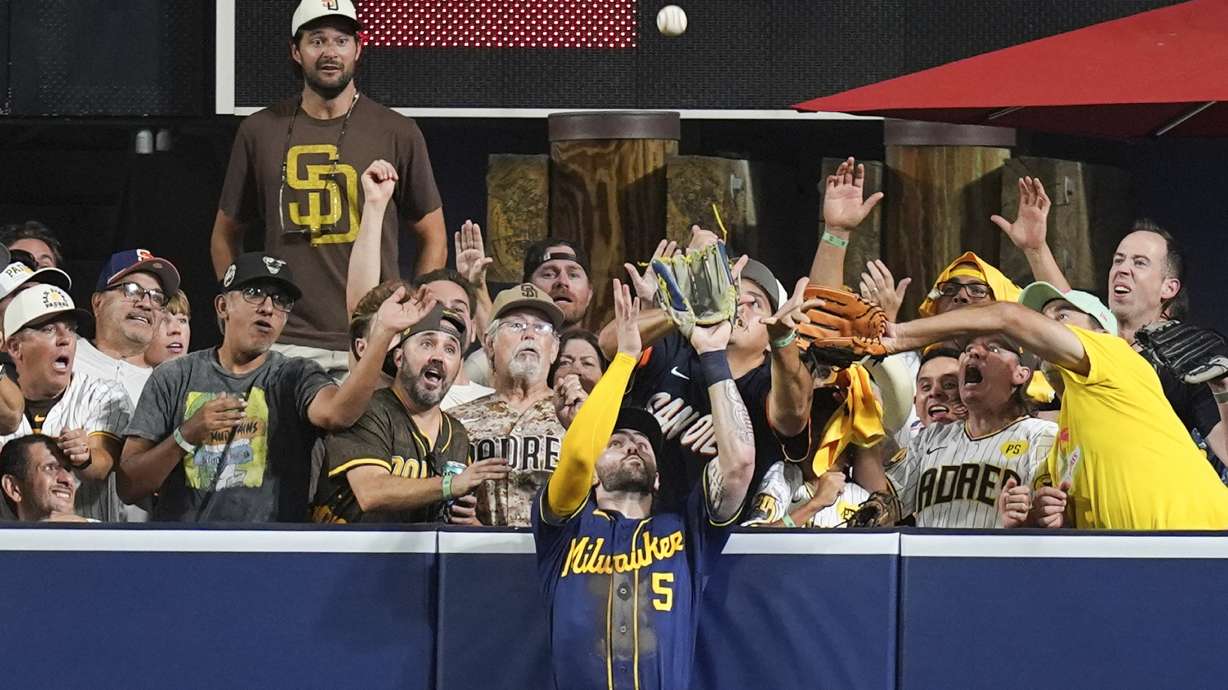 Milwaukee Brewers center fielder Garrett Mitchell catches a ball hit by San Diego Padres' Manny Machado during the eighth inning in Game 4 of baseball's National League Division Series Wednesday, Oct. 7, 2026, in San Diego.