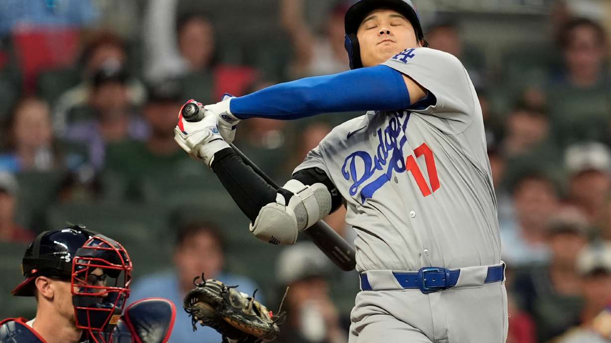 Los Angeles Dodgers two-way player Shohei Ohtani (17) strikes out during the fourth inning in Game 4 of baseball's National League Division Series against the Atlanta Braves, Wednesday, Oct. 7, 2026, in Atlanta.