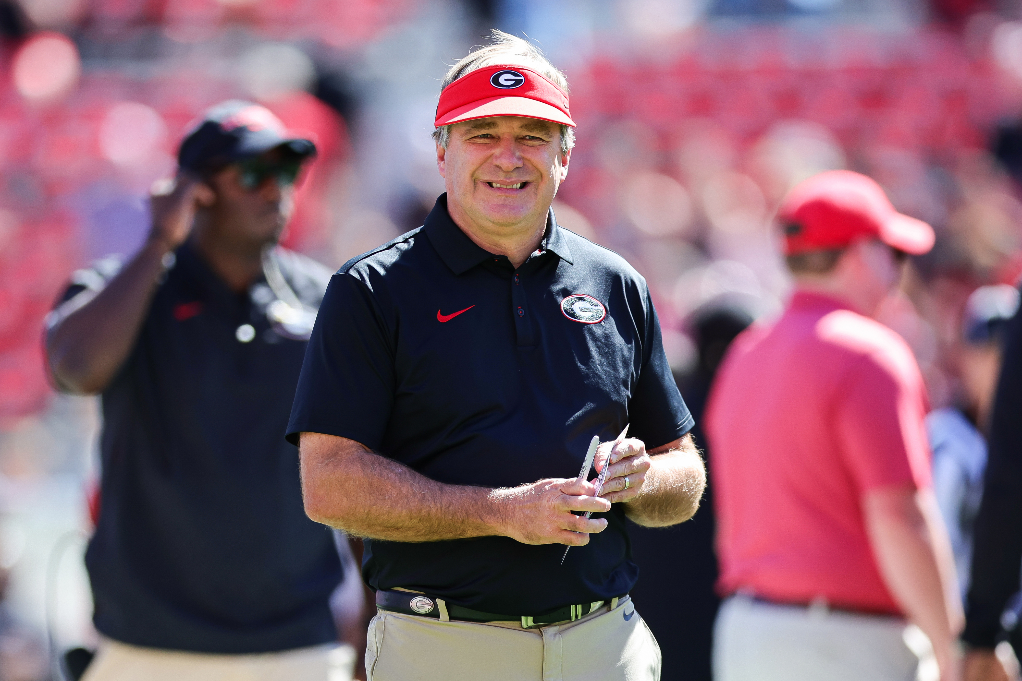 Georgia-Alabama showdown is on schedule despite approach of Hurricane Isaias; Trump will skip game
