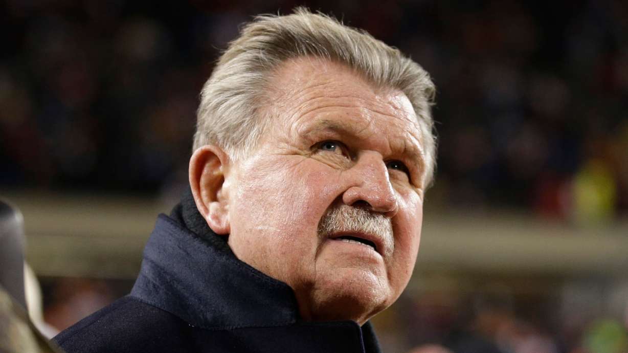 FILE - Former Chicago Bears player and football coach Mike Ditka waits for the halftime ceremony where his No. 89 was to be retired by the Bears during an NFL football game between the Bears and the Dallas Cowboys, Monday, Dec. 9, 2013, in Chicago.