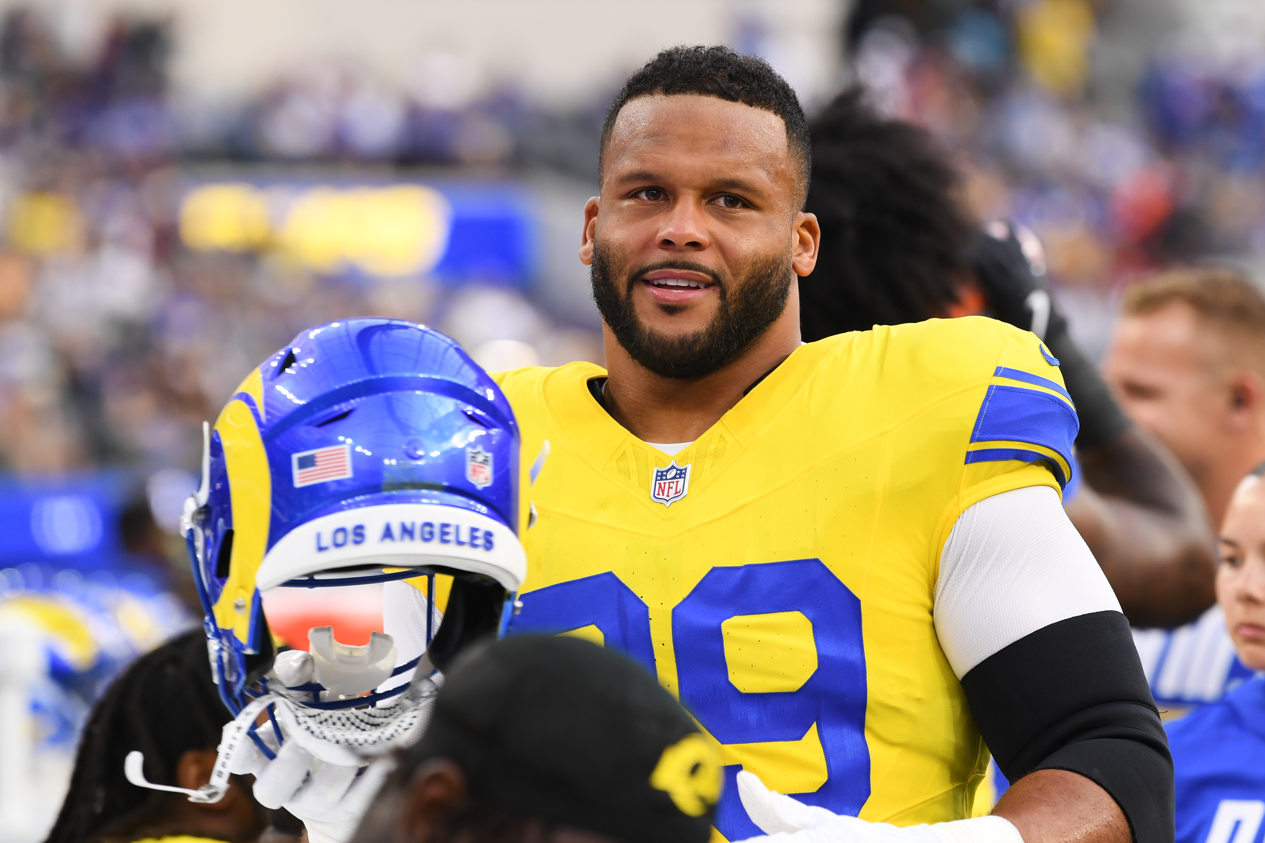 Los Angeles Rams defensive end Aaron Donald looks on from the bench before an NFL football game against the New York Giants in Inglewood, Calif., Monday, Sept. 21, 2026. 