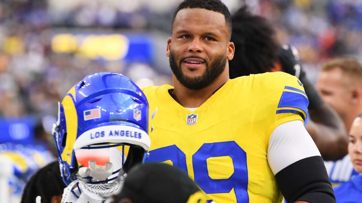 Los Angeles Rams defensive end Aaron Donald looks on from the bench before an NFL football game against the New York Giants in Inglewood, Calif., Monday, Sept. 21, 2026.