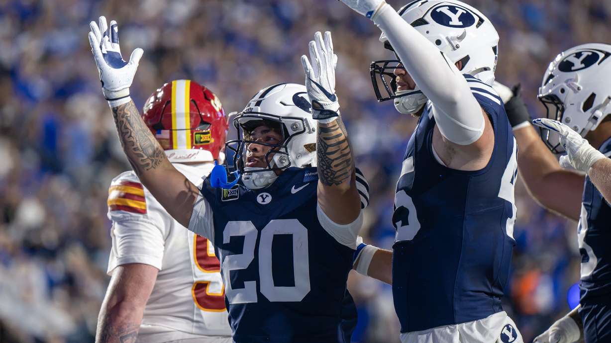 BYU running back Journee Tonga (20) and BYU tight end Keayen Nead (45) celebrate as BYU and Iowa State play at LaVell Edwards Stadium in Provo on Friday, Oct. 9, 2026.