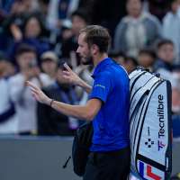 Medvedev advances at Shanghai in 1st match since disqualification. Mustached Alcaraz wins opener