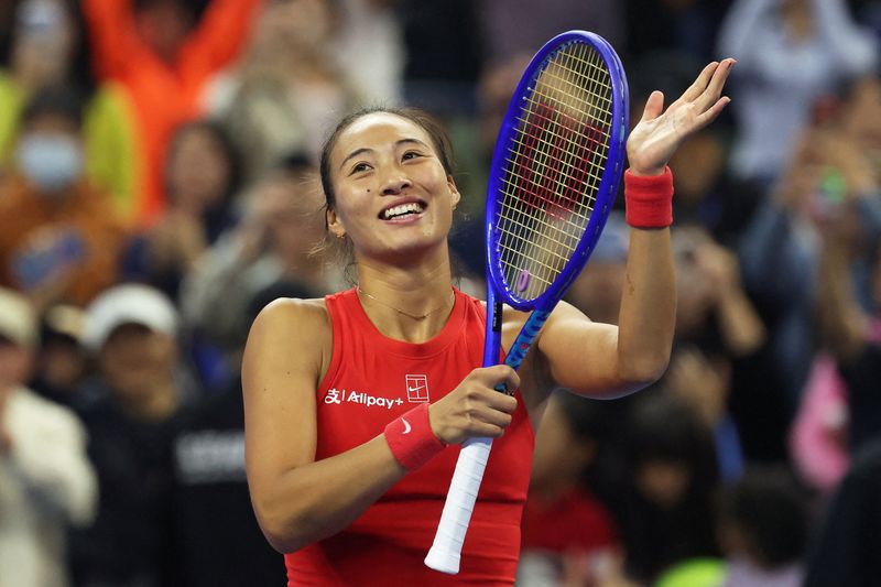Tennis - China Open - National Tennis Center, Beijing, China - October 10, 2026 China's Qinwen Zheng celebrates after winning her semi final match against Belgium's Elise Mertens