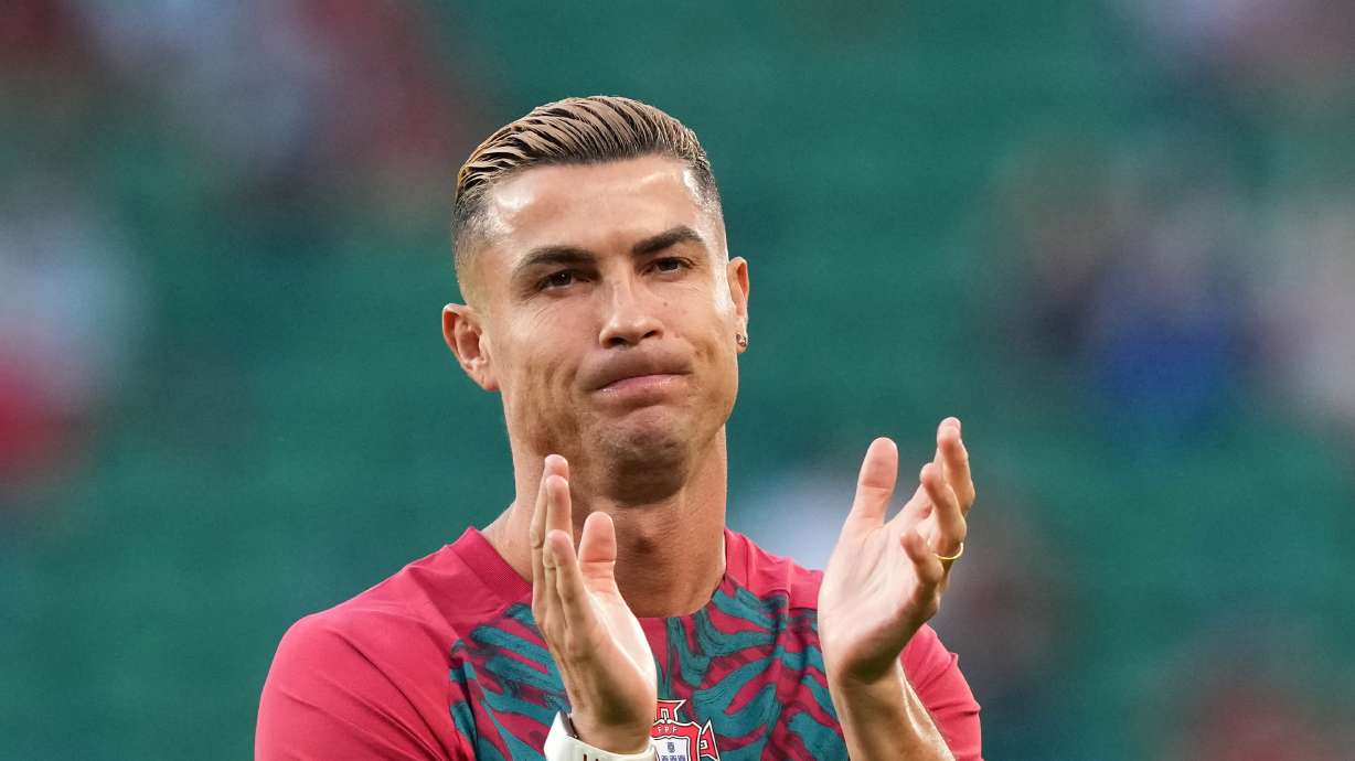 Portugal's Cristiano Ronaldo, wearing a wedding band, claps his hands during warmup before the Nations League soccer match between Portugal and Wales in Lisbon, Thursday, Sept. 24, 2026.