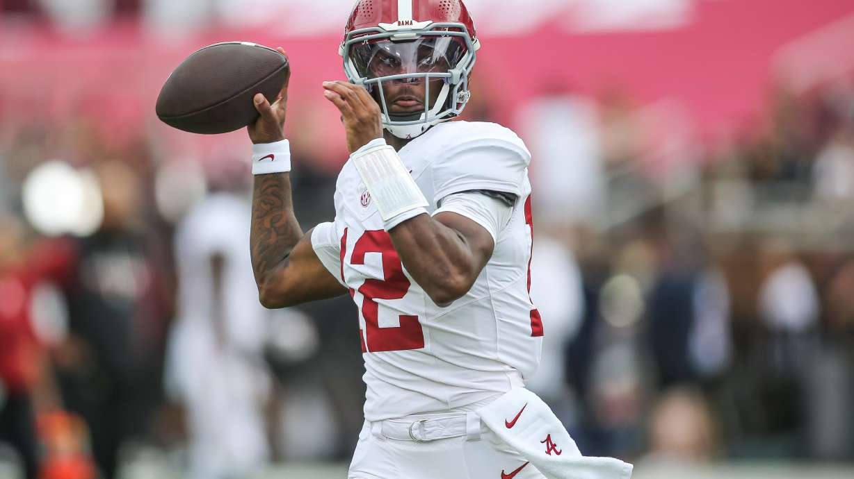 Alabama quarterback Keelon Russell (12) warms up before of an NCAA college football game in Starkville, Miss., Saturday, Oct. 3, 2026.