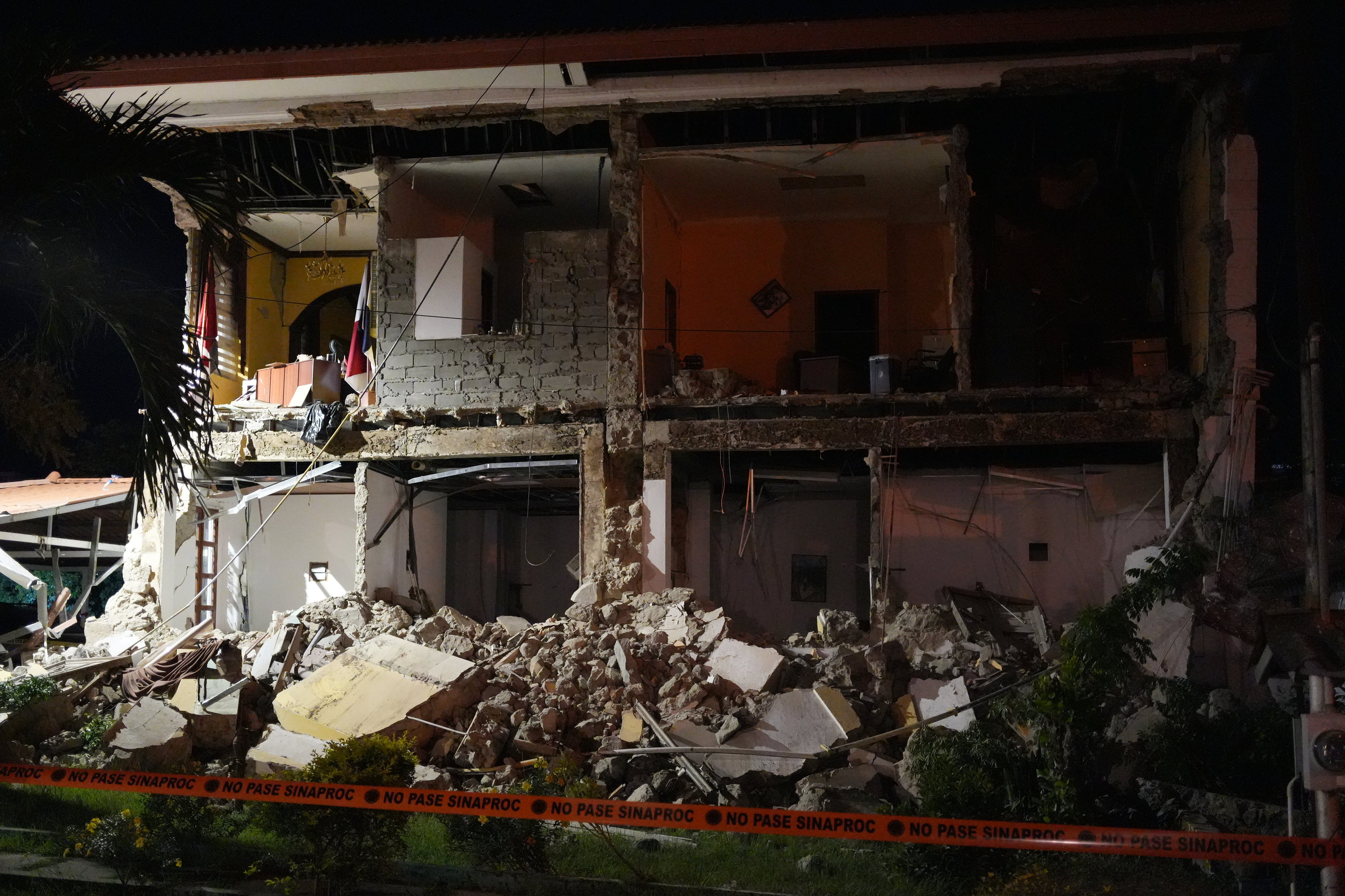 A partially collapsed building stands after an earthquake struck Penonome, Panama, Friday. The nation declared a state of emergency following the powerful quakes that hit the country.