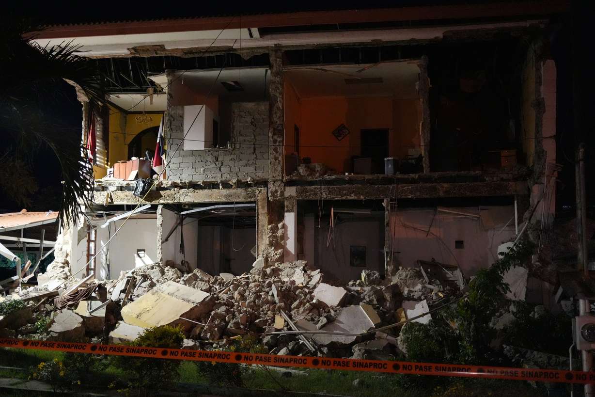A partially collapsed building stands after an earthquake struck Penonome, Panama, Friday. The nation declared a state of emergency following the powerful quakes that hit the country.