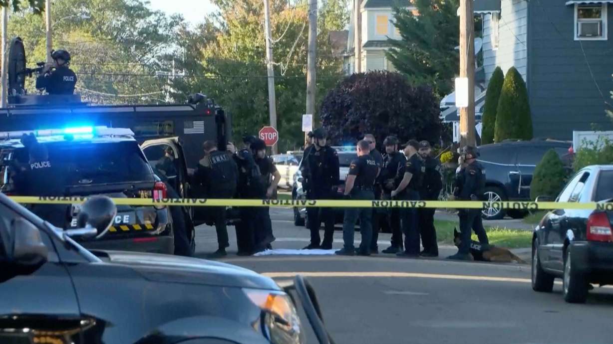 Law enforcement officers remain at the scene of a deadly shooting that occurred Friday night in Erie, Pa., on Saturday. Nine people are dead, including the shooter, but details are scant so far.