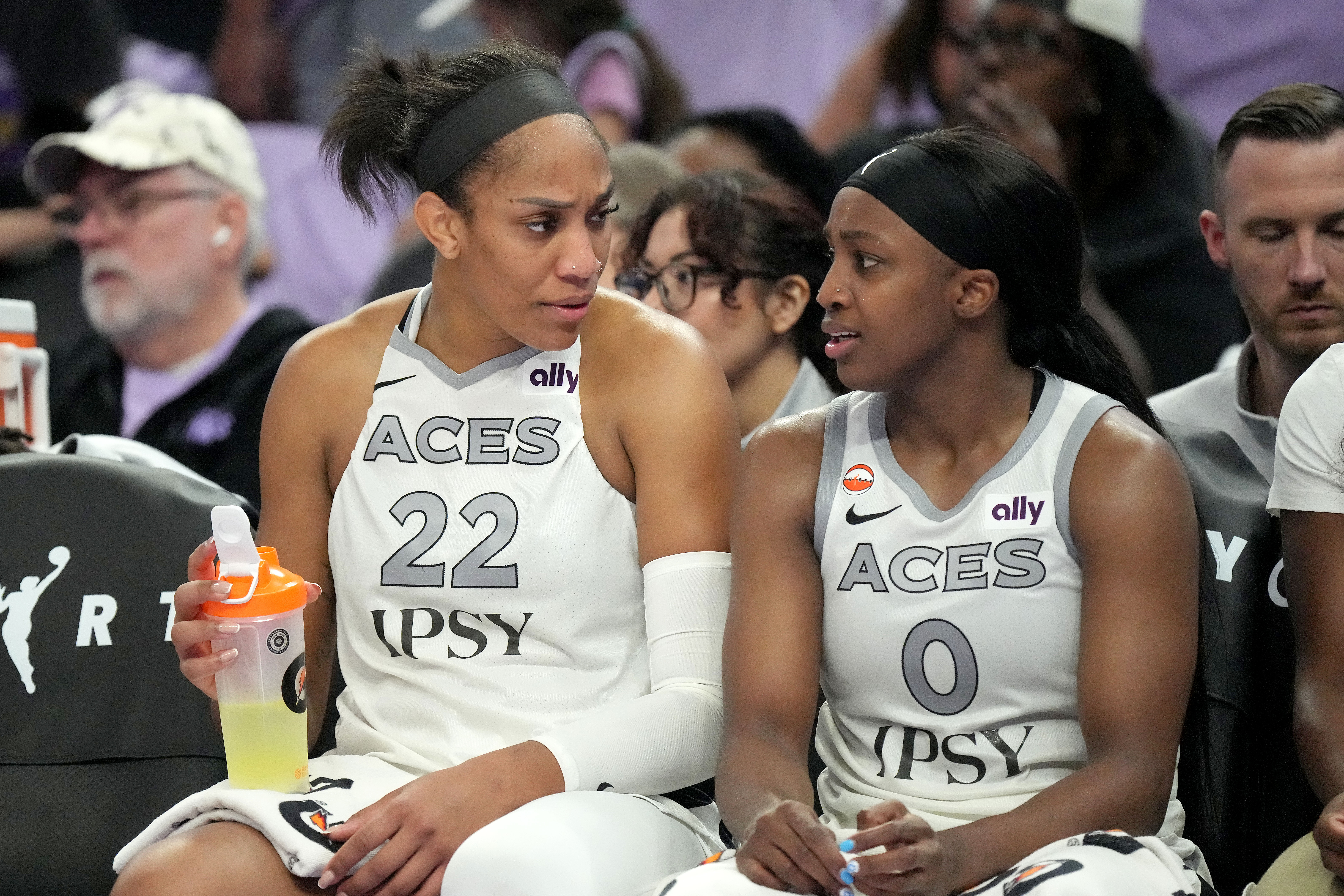 Las Vegas Aces center A'ja Wilson (22) talks with guard Jackie Young (0) on the bench in the final seconds of Game 1 of the WNBA basketball semifinals against the Golden State Valkyries in San Francisco, Sunday, Oct. 4, 2026. 