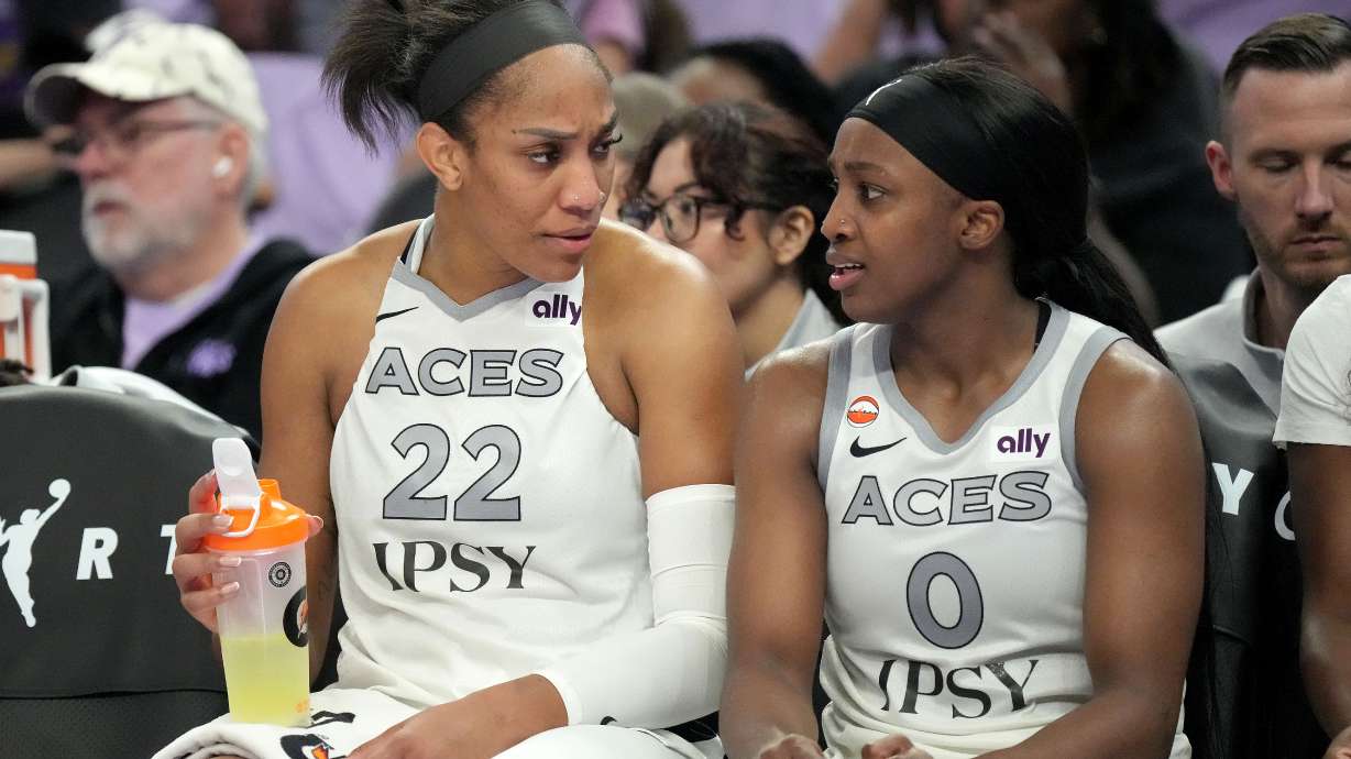 Las Vegas Aces center A'ja Wilson (22) talks with guard Jackie Young (0) on the bench in the final seconds of Game 1 of the WNBA basketball semifinals against the Golden State Valkyries in San Francisco, Sunday, Oct. 4, 2026.