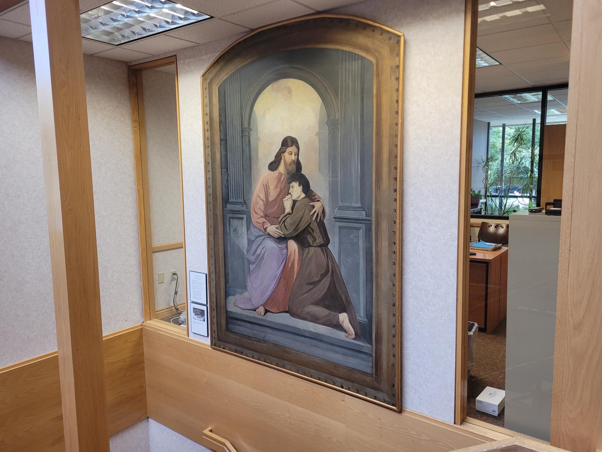 'The Consoling Christ' was originally hung beside the organ in the Zion Lutheran Evangelical Church before it was likely given to another Lutheran Church. It was restored and hung in the Zion Lutheran Evangelical Church in 2025.