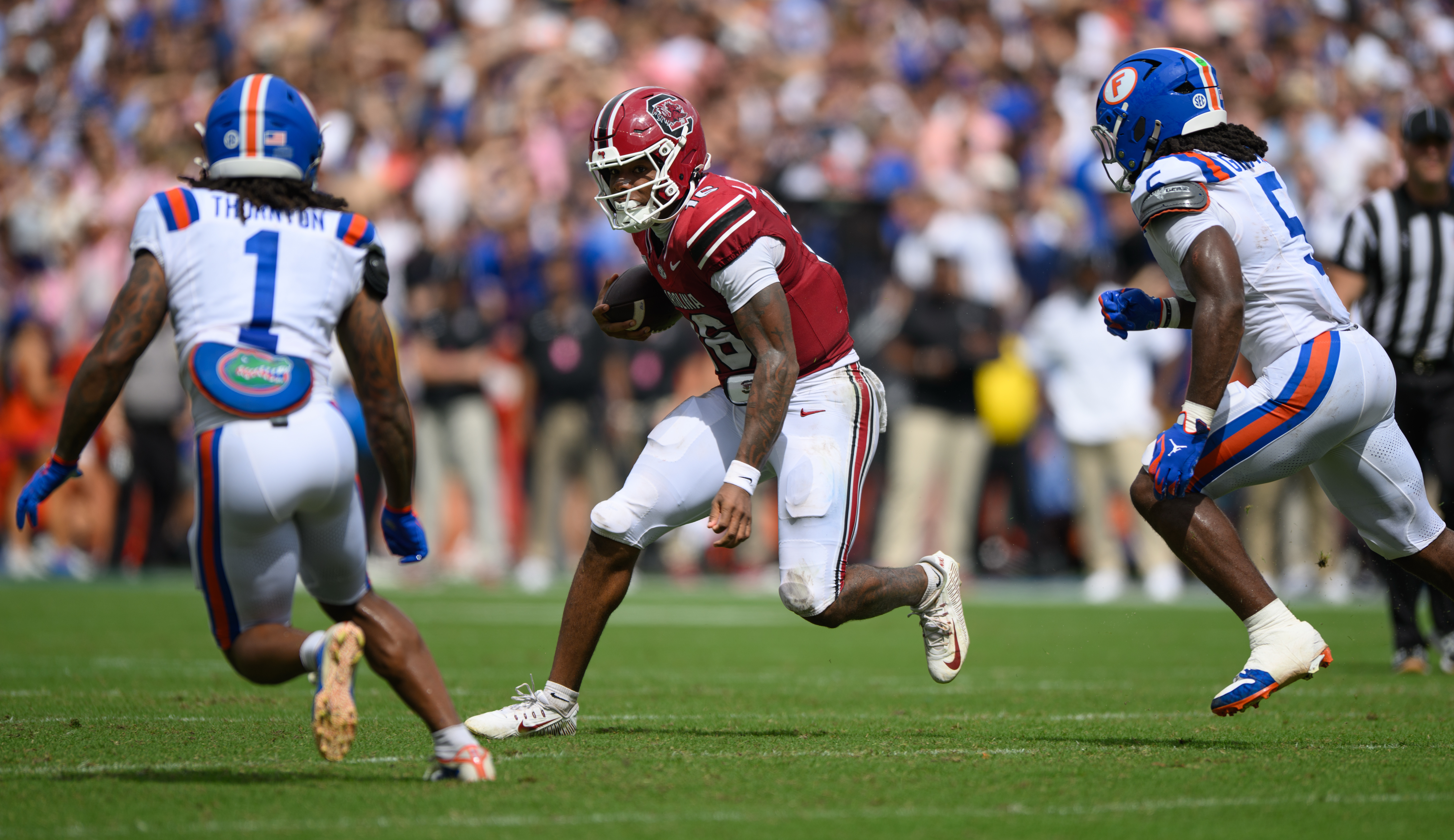 South Carolina quarterback LaNorris Sellers (16) rushes during the first half of an NCAA college football game against Florida, Saturday, Oct. 10, 2026, in Gainesville, Fla. 