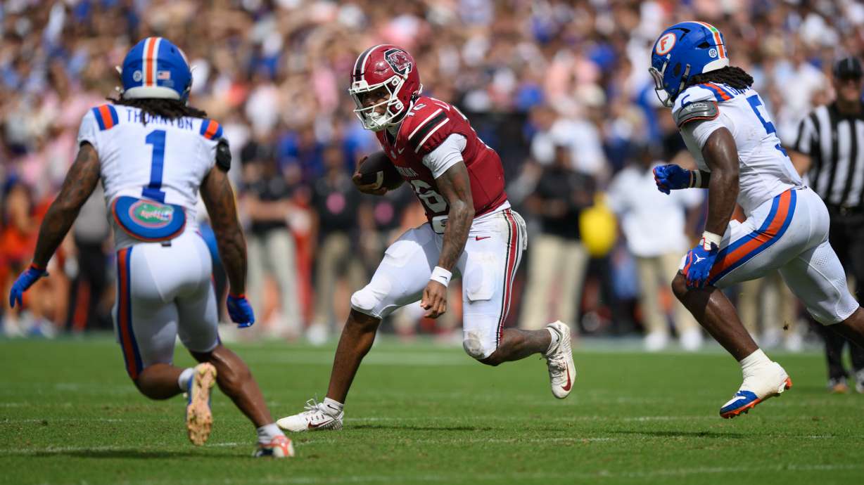 South Carolina quarterback LaNorris Sellers (16) rushes during the first half of an NCAA college football game against Florida, Saturday, Oct. 10, 2026, in Gainesville, Fla.