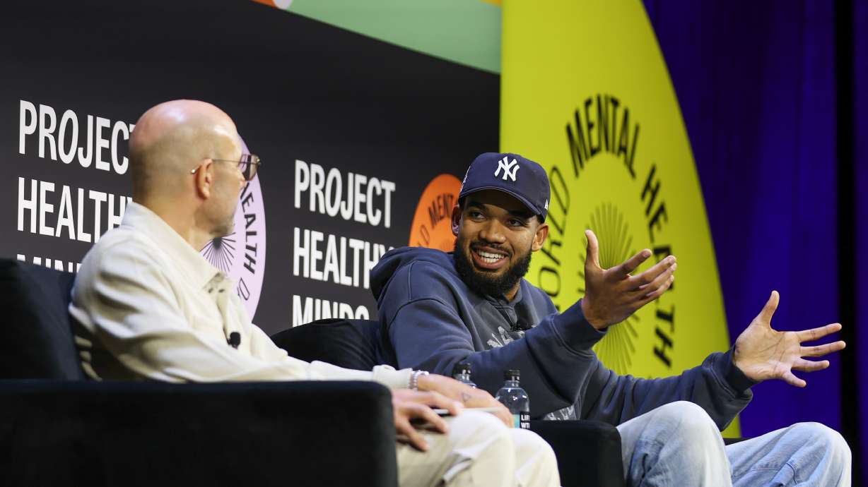 NBA player Karl-Anthony Towns of the New York Knicks sits for a discussion with Rich Kleiman at the Project Healthy Minds World Mental Health Day Festival, Saturday, Oct. 10, 2026, in New York.