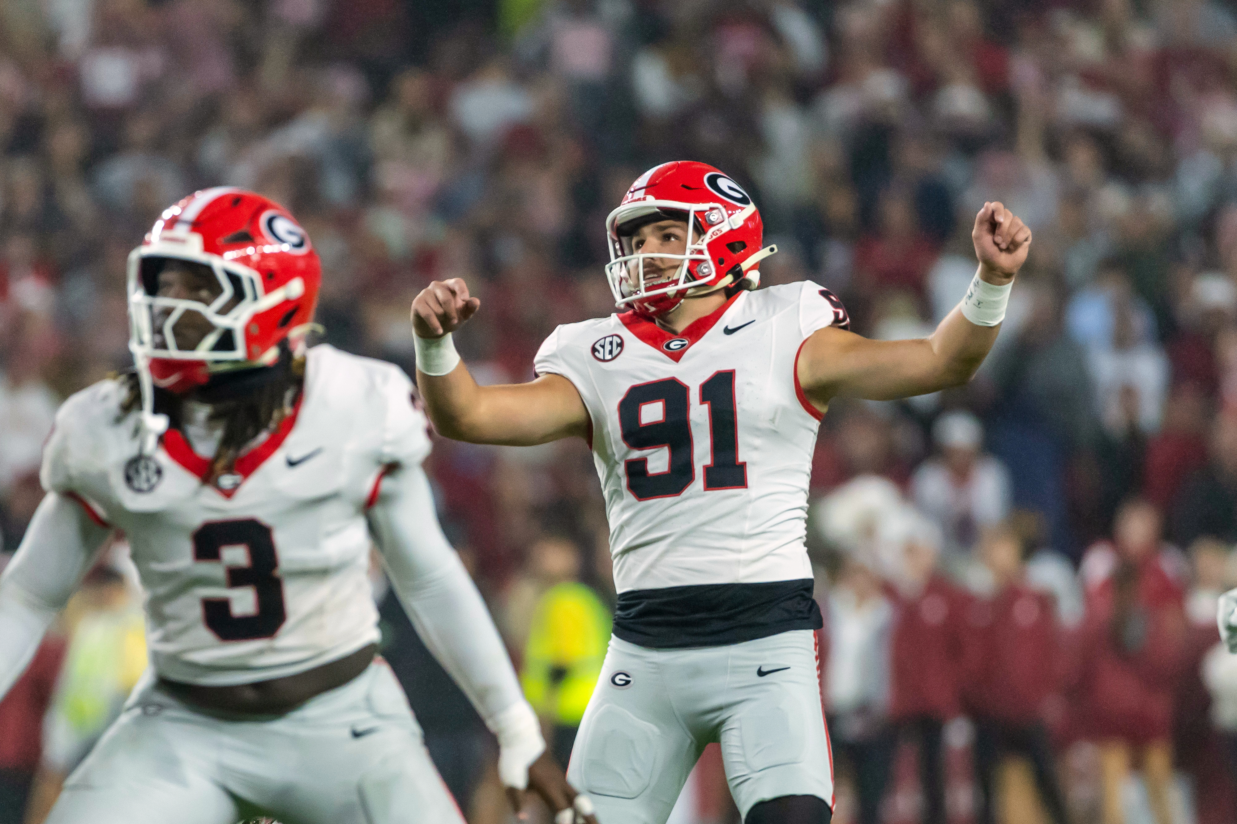 Georgia kicker Peyton Woodring (91) watches his field goal against Alabama during the first half of an NCAA college football game Saturday, Oct. 10, 2026, in Tuscaloosa, Ala. 