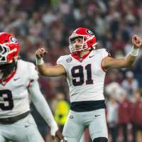 Dwight Phillips Jr. and No. 2 Georgia run past No. 6 Alabama 20-17 in an SEC clash