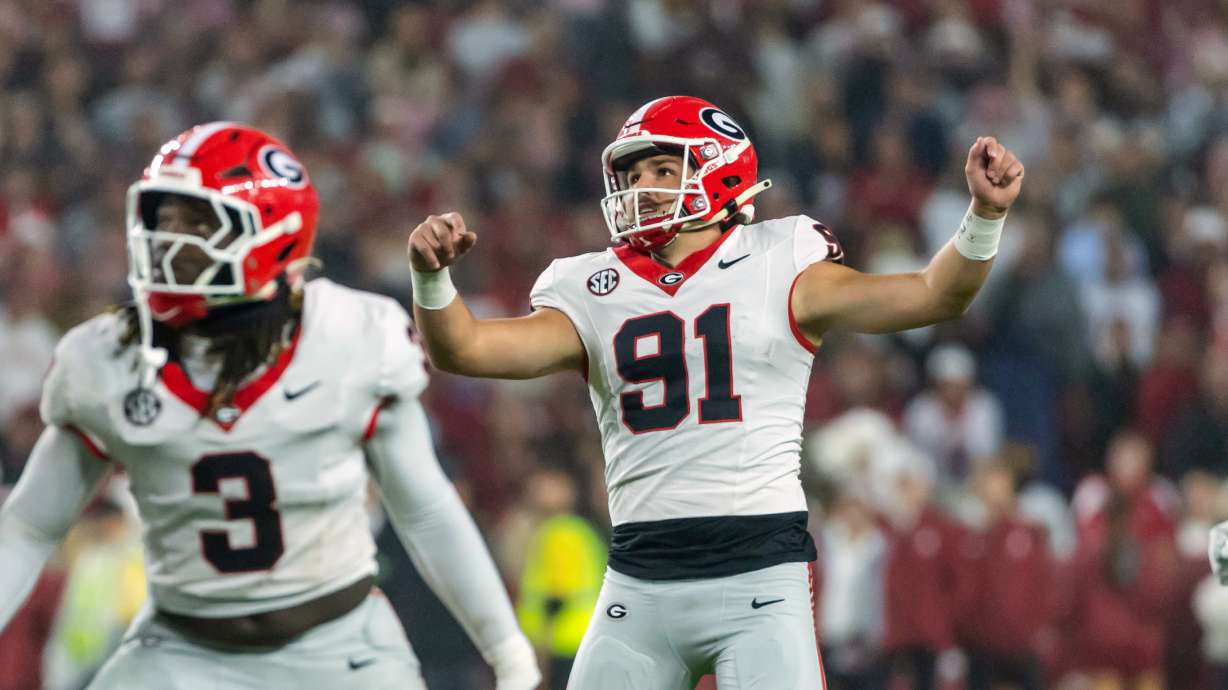 Georgia kicker Peyton Woodring (91) watches his field goal against Alabama during the first half of an NCAA college football game Saturday, Oct. 10, 2026, in Tuscaloosa, Ala.