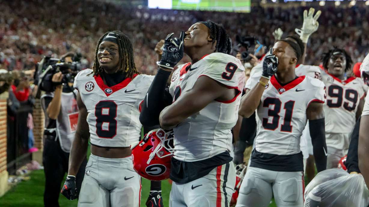 Georgia linebacker Chris Cole (9) celebrates with the Georgia fans as the final seconds wind off the clock in a win over Alabama during the second half of an NCAA college football game Saturday, Oct. 10, 2026, in Tuscaloosa, Ala.
